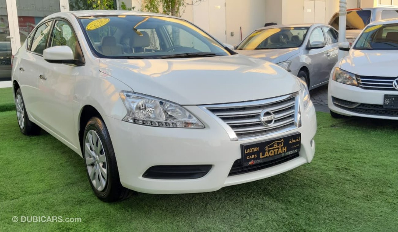 Nissan Sentra Gulf - agency condition - white paint inside beige in excellent condition, you do not need any expen