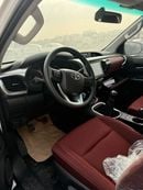 Toyota Hilux 2.7L - Super White Inside Red