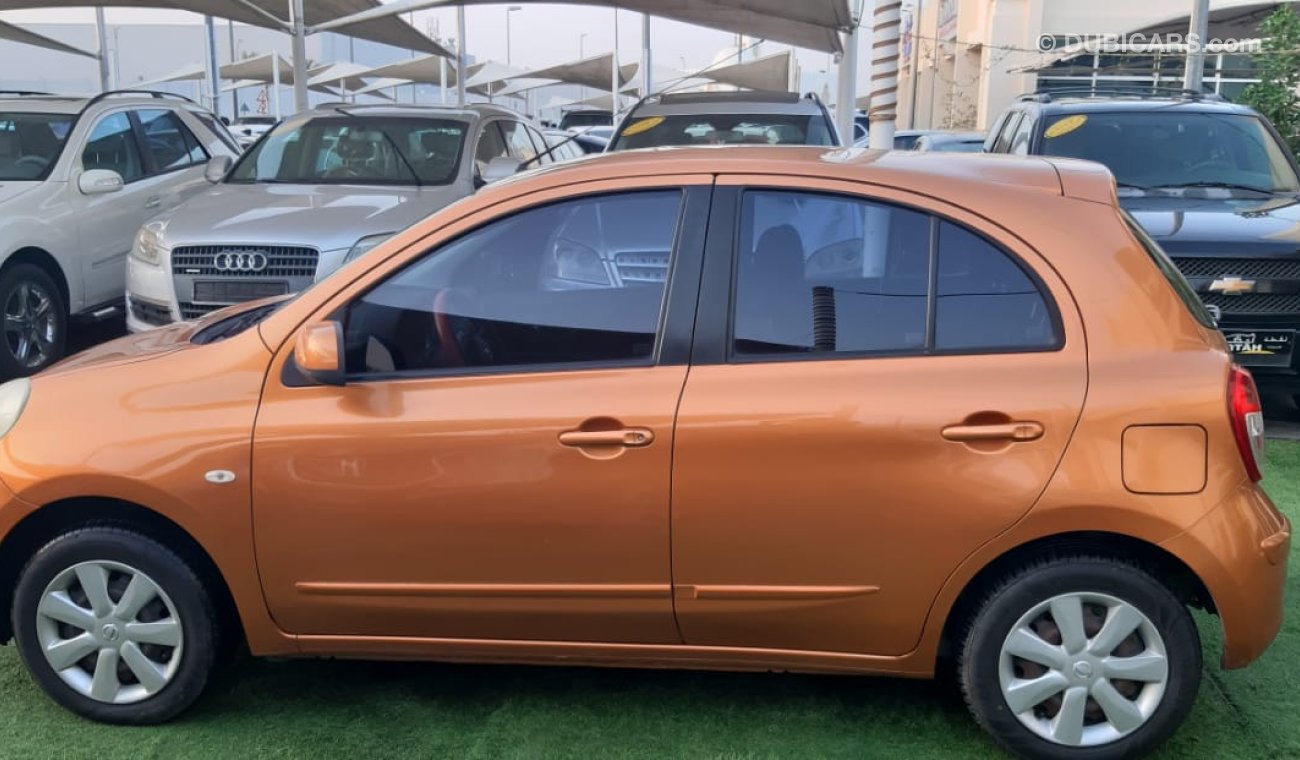 Nissan Micra GCC - orange color in silver - in excellent condition, do not need any expenses