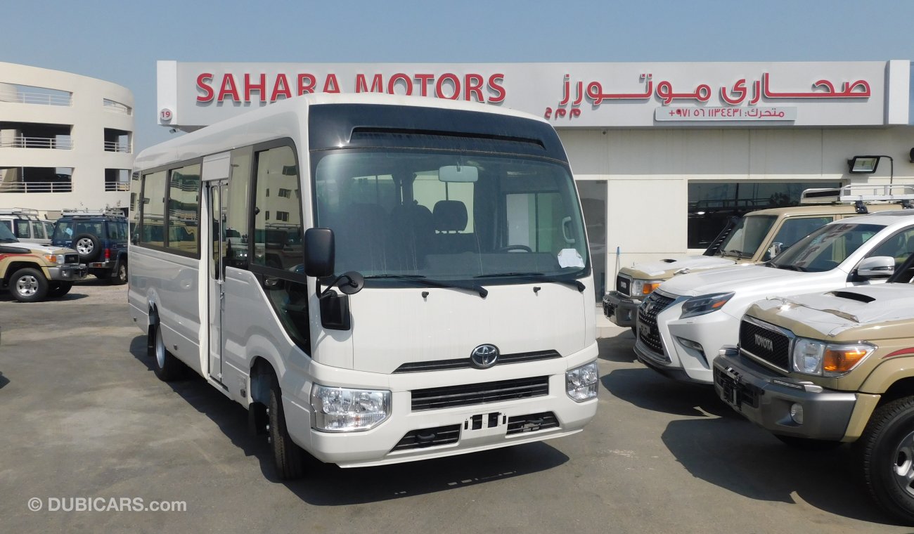 Toyota Coaster 4.2L M/T Diesel 23 passengers - Auto folding door