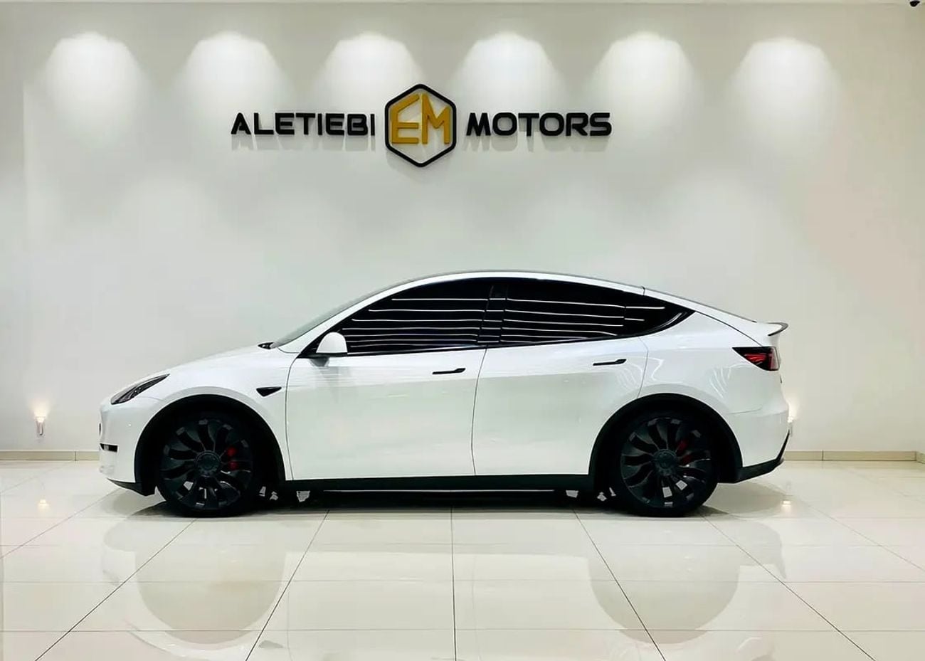 Tesla Model Y LONG RANGE Y DUAL MOTOR MODEL : K M : 10, 000 GCC SPECS UNDER WARRANTY AND SERVICE