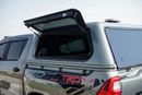 Toyota Hilux A Hilux canopy is a protective shell with a roof, walls, and windows that fits over the tray of a To