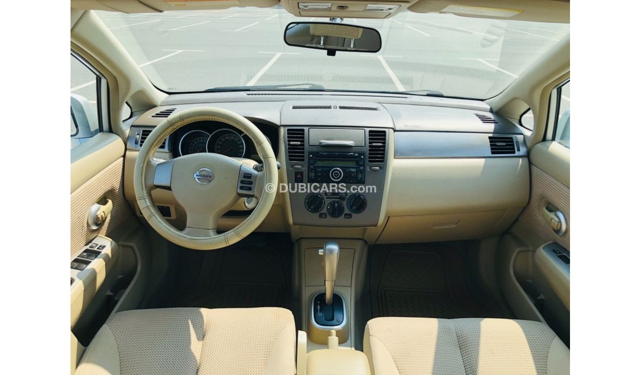 نيسان تيدا موديل 2012 خليجي فل مواصفات فتحه سقف مالك واحد من الوكاله مفتاحين فل مواصفات فتحه سقف