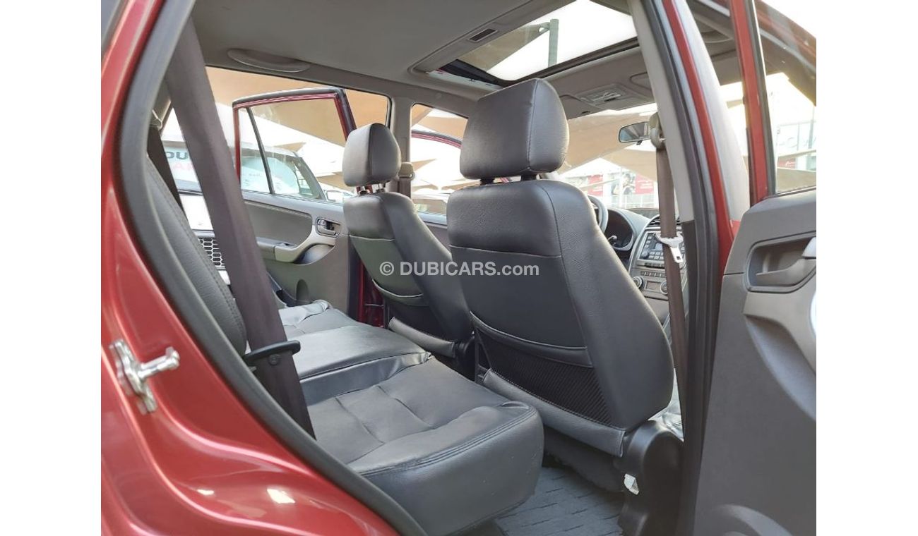 Chery Tiggo Model 2015 No. 1 red color inside beige leather hatch installed in excellent condition that does not