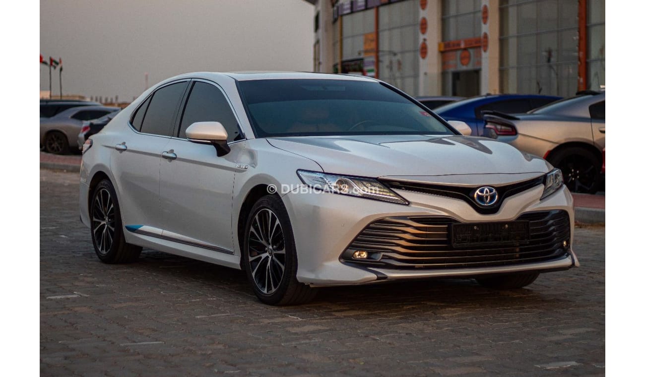 Toyota Camry Limited Toyota Camry hybrid Model : 2020 Price: 90,000 dirhams  Mileage: 58,000 km  Gulf specificati