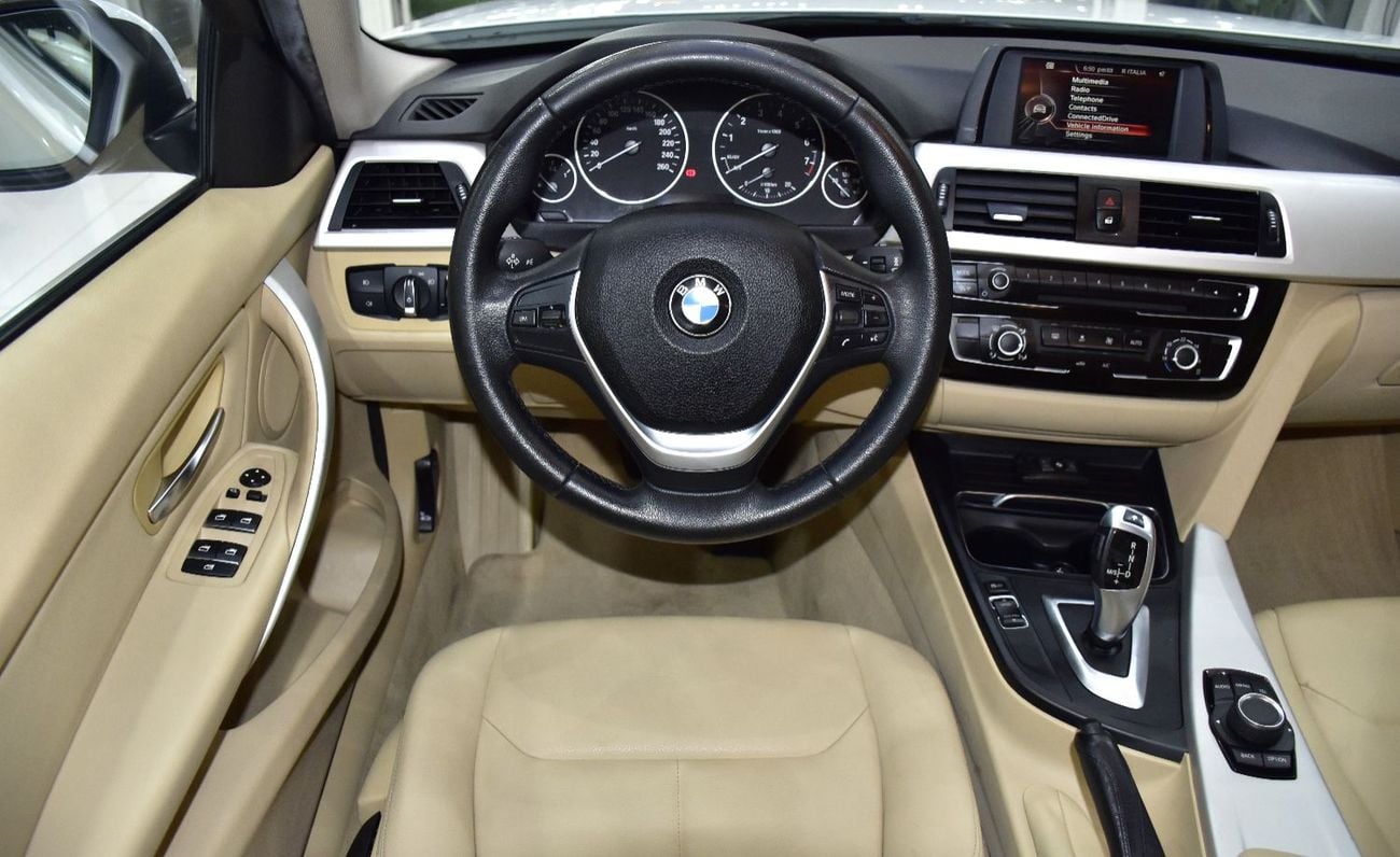 BMW 318i EXCELLENT DEAL for our BMW 318i ( 2016 Model ) in White Color GCC Specs