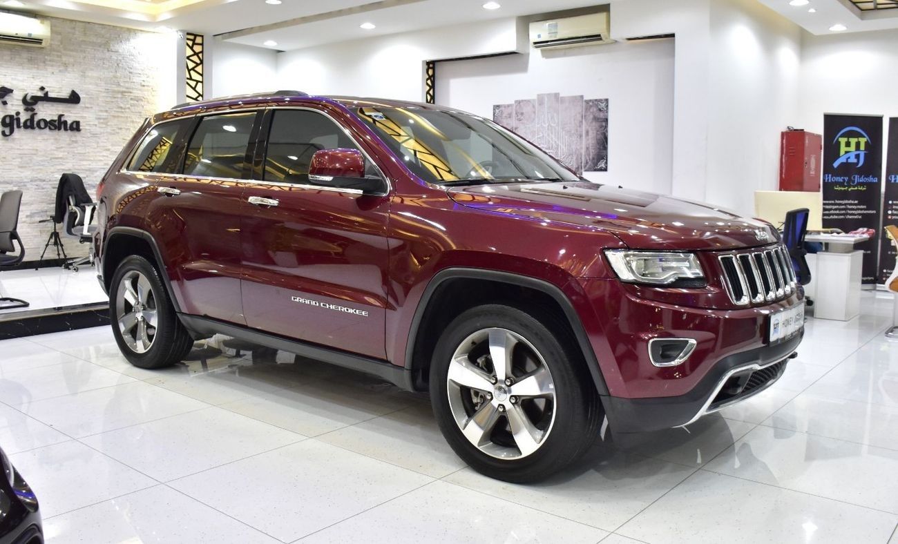 Jeep Grand Cherokee EXCELLENT DEAL for our Jeep Grand Cherokee Limited 4x4 ( 2016 Model ) in Red Color GCC Specs