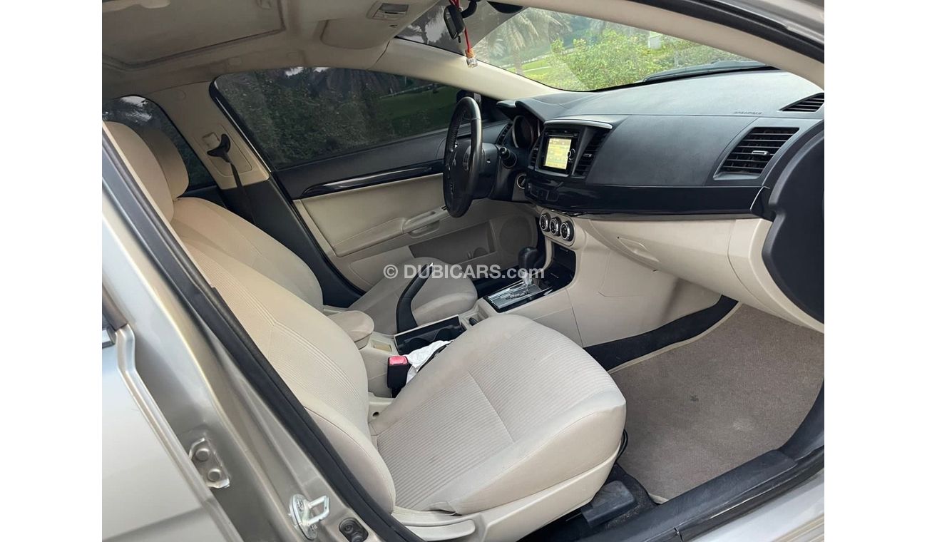 Mitsubishi Lancer MITSUBISHI LANCER 2,0 - GLS- mobile 2014 Excellent Conditio  Very celen car Full automatic Free acci