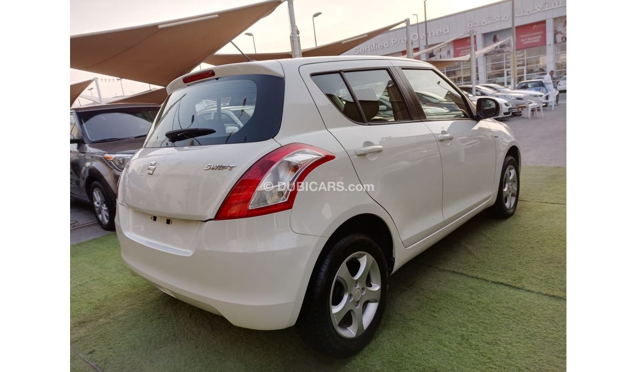 Suzuki Swift Gulf model 2014, center look, rims, air conditioning, without accidents, in excellent condition, you