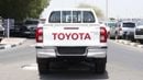 Toyota Hilux 2.4L diesel  . White 2025 model, M/T Wide body with Chrome bumper
