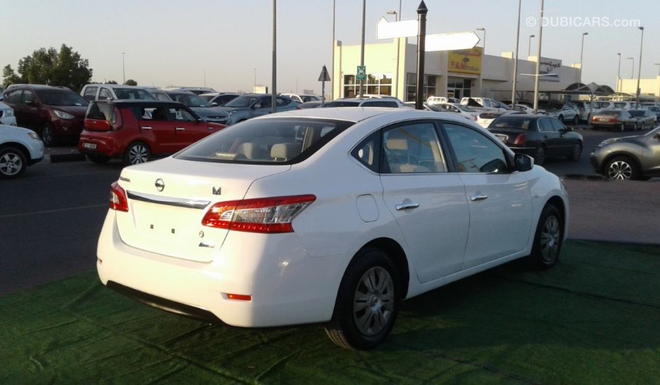 Nissan Sentra 2015 white 1.8 Gcc Excellent Condition without Accidents