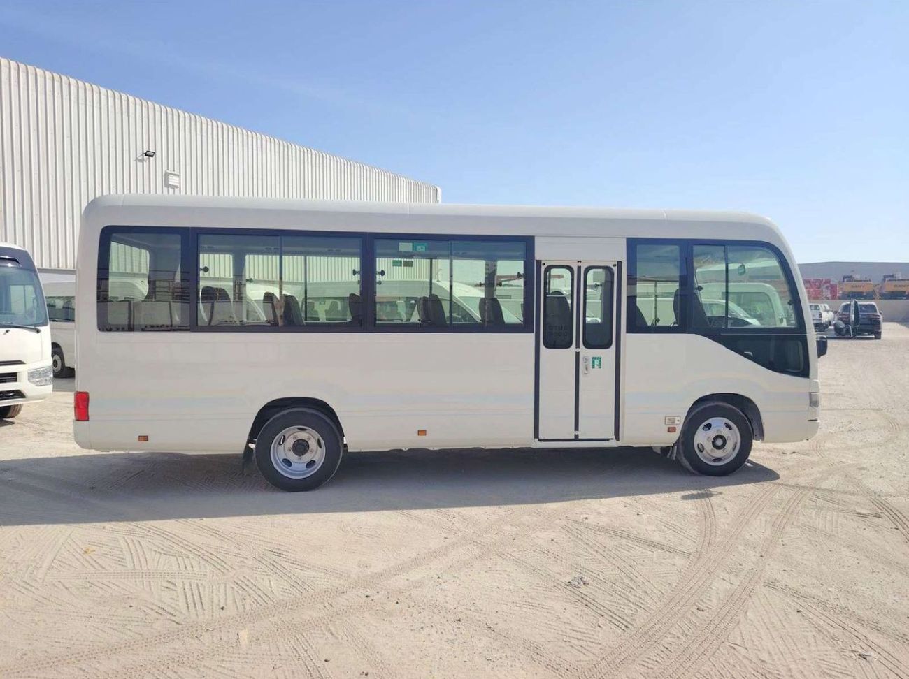 تويوتا كوستر 2025 Toyota Coaster High-Roof 23-Seater (2-Point Seatbelts) 4.0L 4-Cyl Turbo Diesel M/T RWD Export O