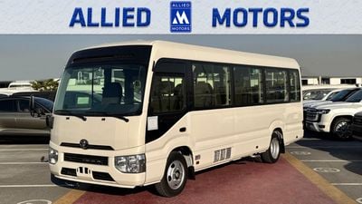 Toyota Coaster 2026 TOYOTA COASTER HIROOF 4.0L DIESEL M/T 22 SEATER 3PELR LUGGAGE RACK BRAND NEW 0KM