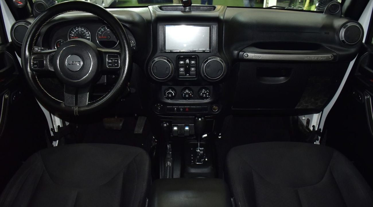 Jeep Wrangler EXCELLENT DEAL for our Jeep Wrangler Unlimited Sport ( 2014 Model ) in White Color GCC Specs