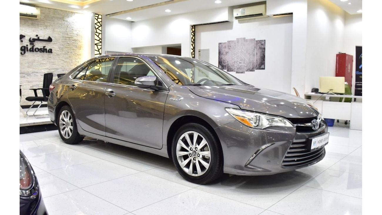 Toyota Camry EXCELLENT DEAL for our Toyota Camry LE Hybrid ( 2017 Model ) in Grey Color American Specs
