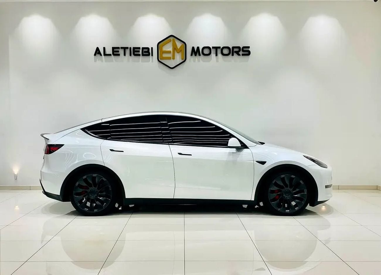 Tesla Model Y LONG RANGE Y DUAL MOTOR MODEL : K M : 10, 000 GCC SPECS UNDER WARRANTY AND SERVICE