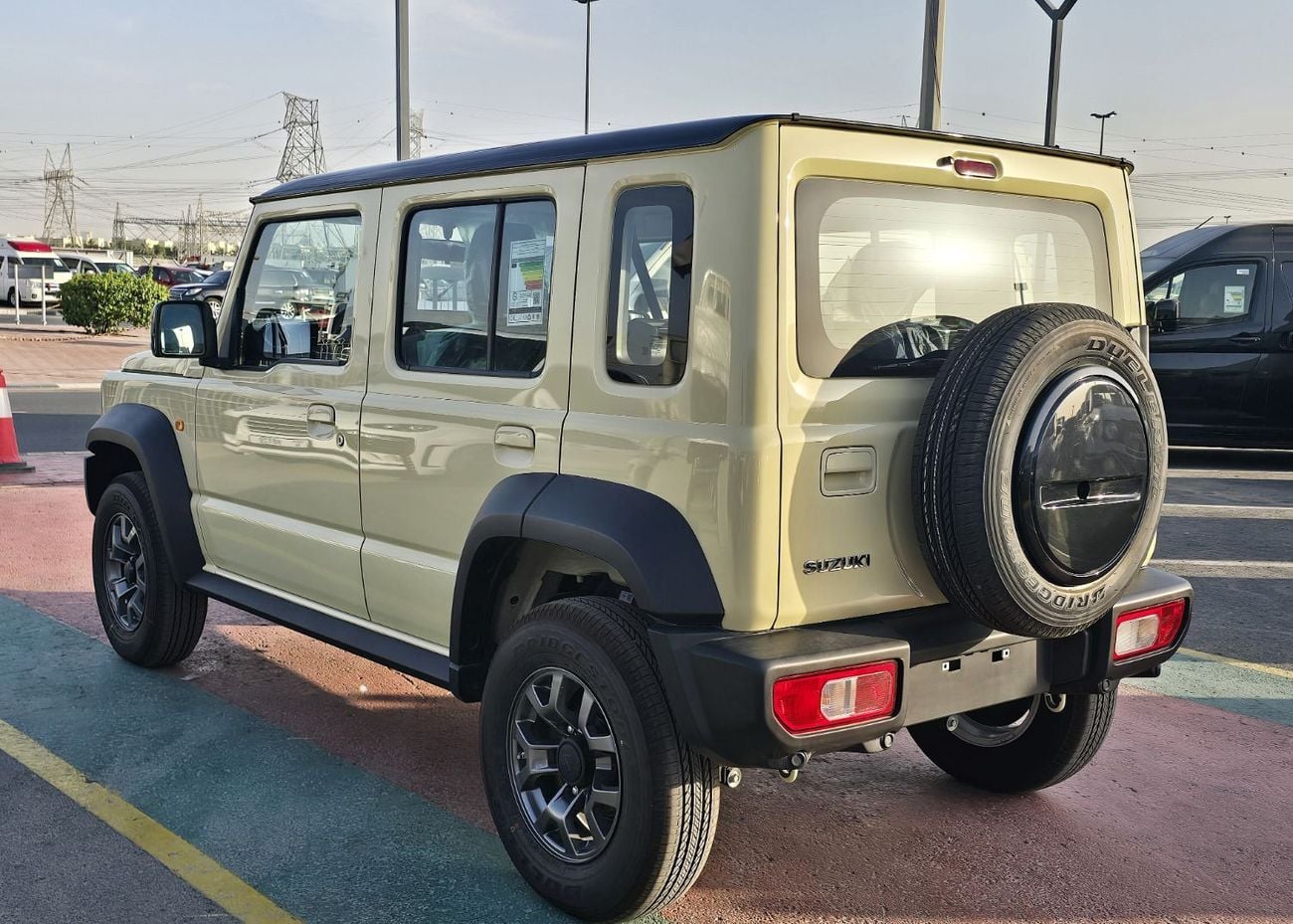 سوزوكي جيمني SUZUKI Jimny GLX 1.5L AT SUV 4WD 5Doors beige color with black roof gcc 2026 model