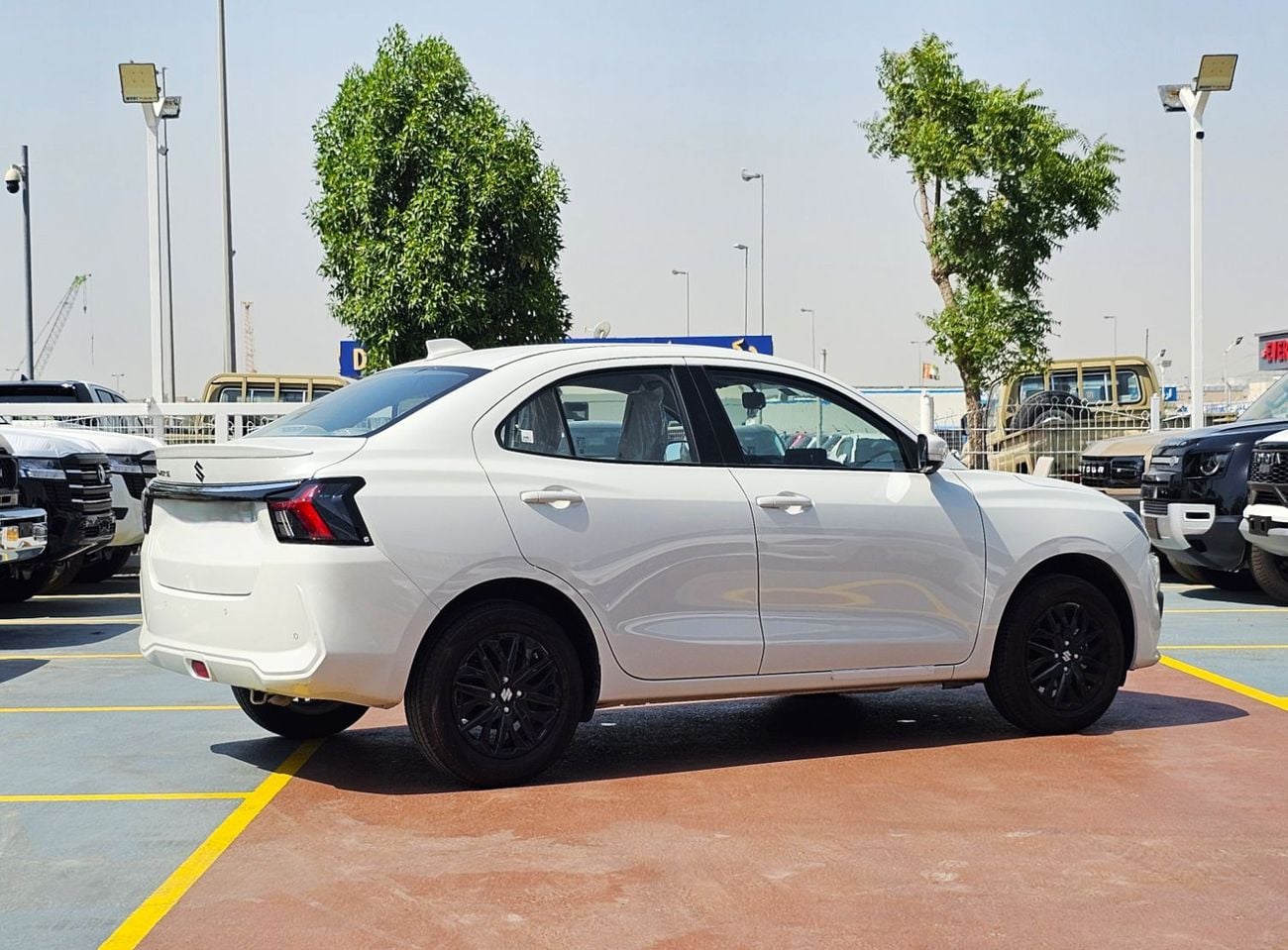 سوزوكي دزاير SUZUKI DZIRE GL+ 1.2 YM2026 GCC SPECS WITH REAR CAMERA