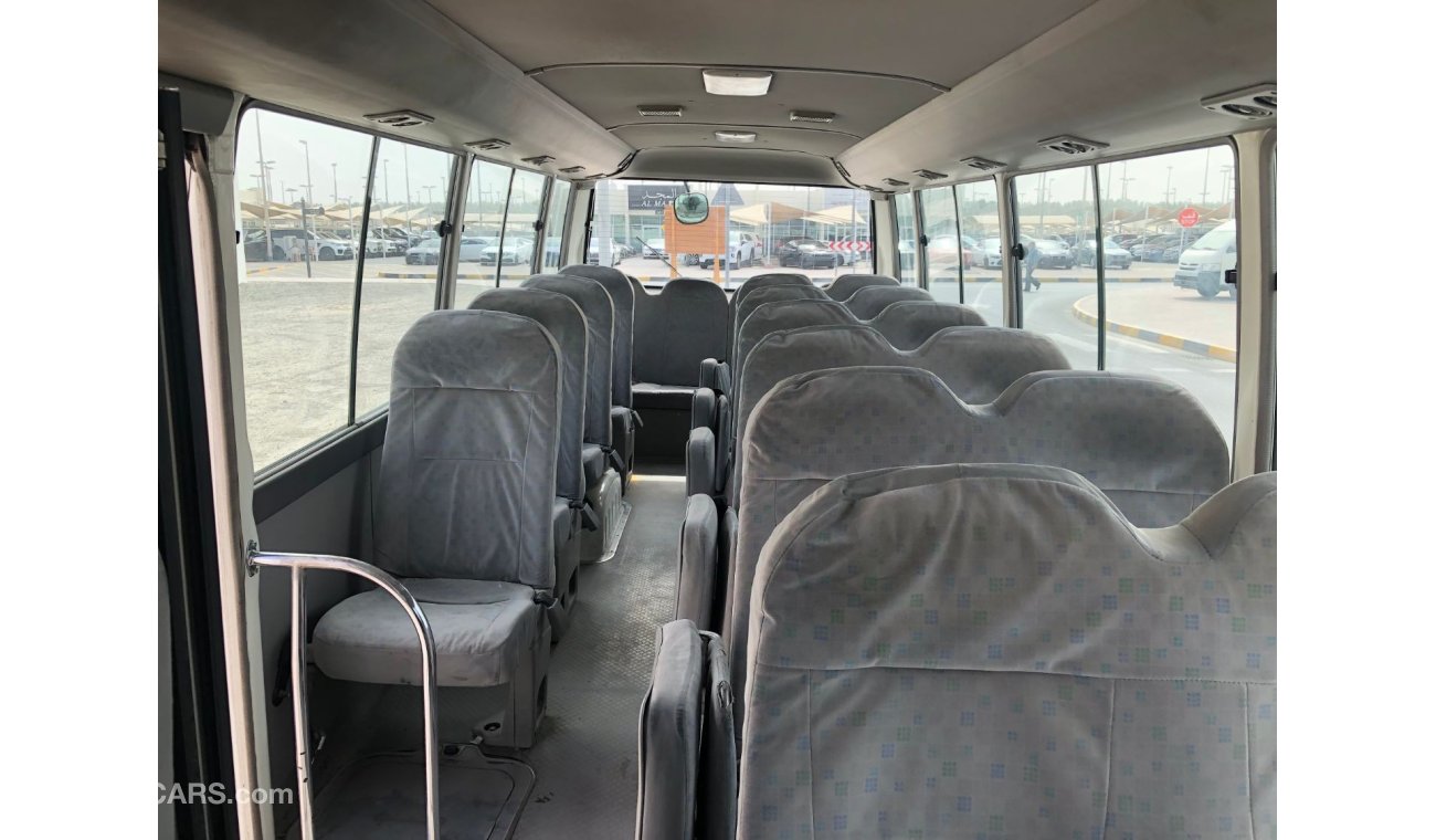 تويوتا كوستر Toyota coaster 30 seater bus Diesel, Model:2015. Excellent condition