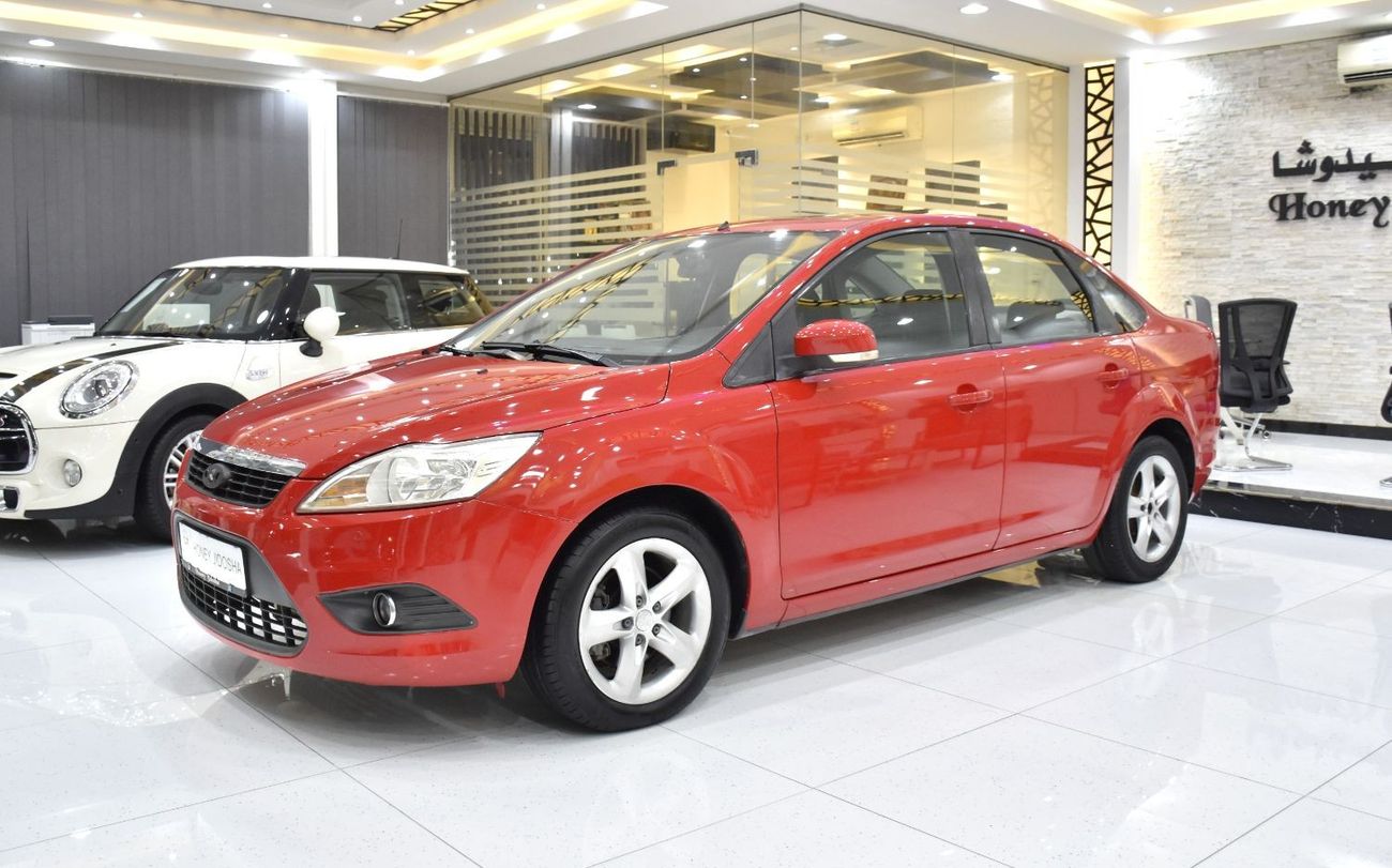 Ford Focus EXCELLENT DEAL for our Ford Focus ( 2010 Model ) in Red Color GCC Specs
