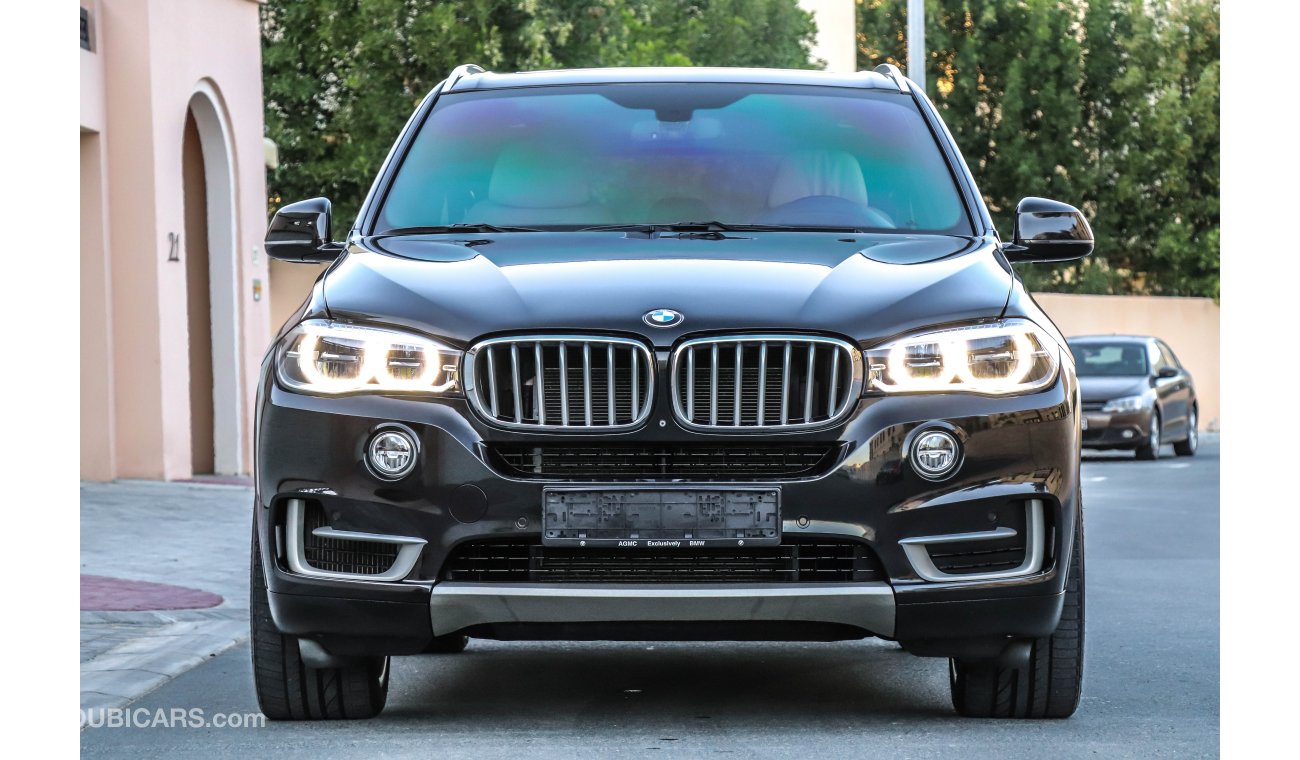 BMW X5 X-Drive 50i 2014 GCC under Agency Warranty & Service contract with Zero Down-Payment.