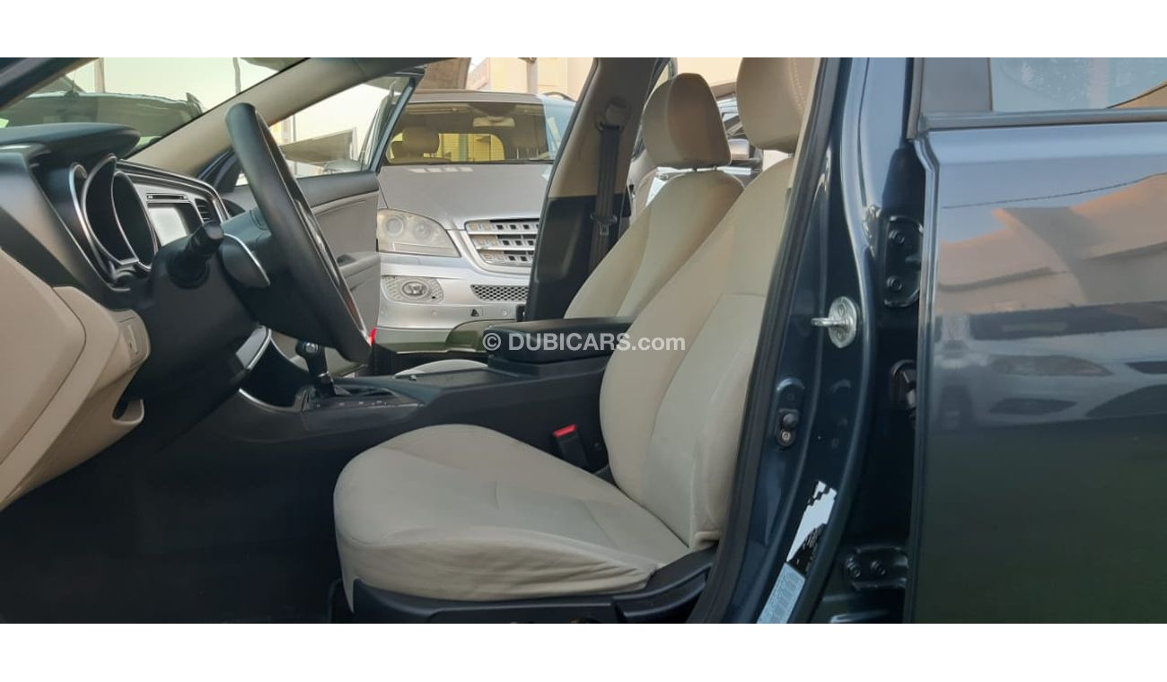 كيا أوبتيما خليجى رقم 2  شاشة   كاميرا  مثبت  سرعة  جناح خلفى رنجات حساسات أنوار ضباب بحالة ممتازة