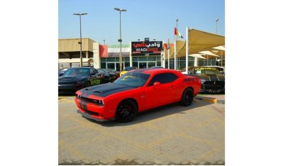 Dodge Challenger R/T Hemi engine 5.7 km hp?   The 5.7L HEMI® V8 engine continues the legend with power, armed with a