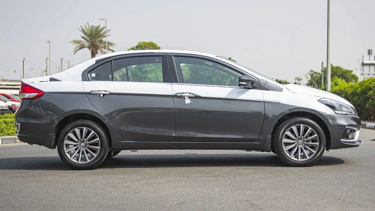 Suzuki Ciaz ALLOY RIMS, PUSH START + REAR VIEW CAMERA, SMALL DISPLAY IN CETRE VIEW MIRROR, CRUISE CONTROL