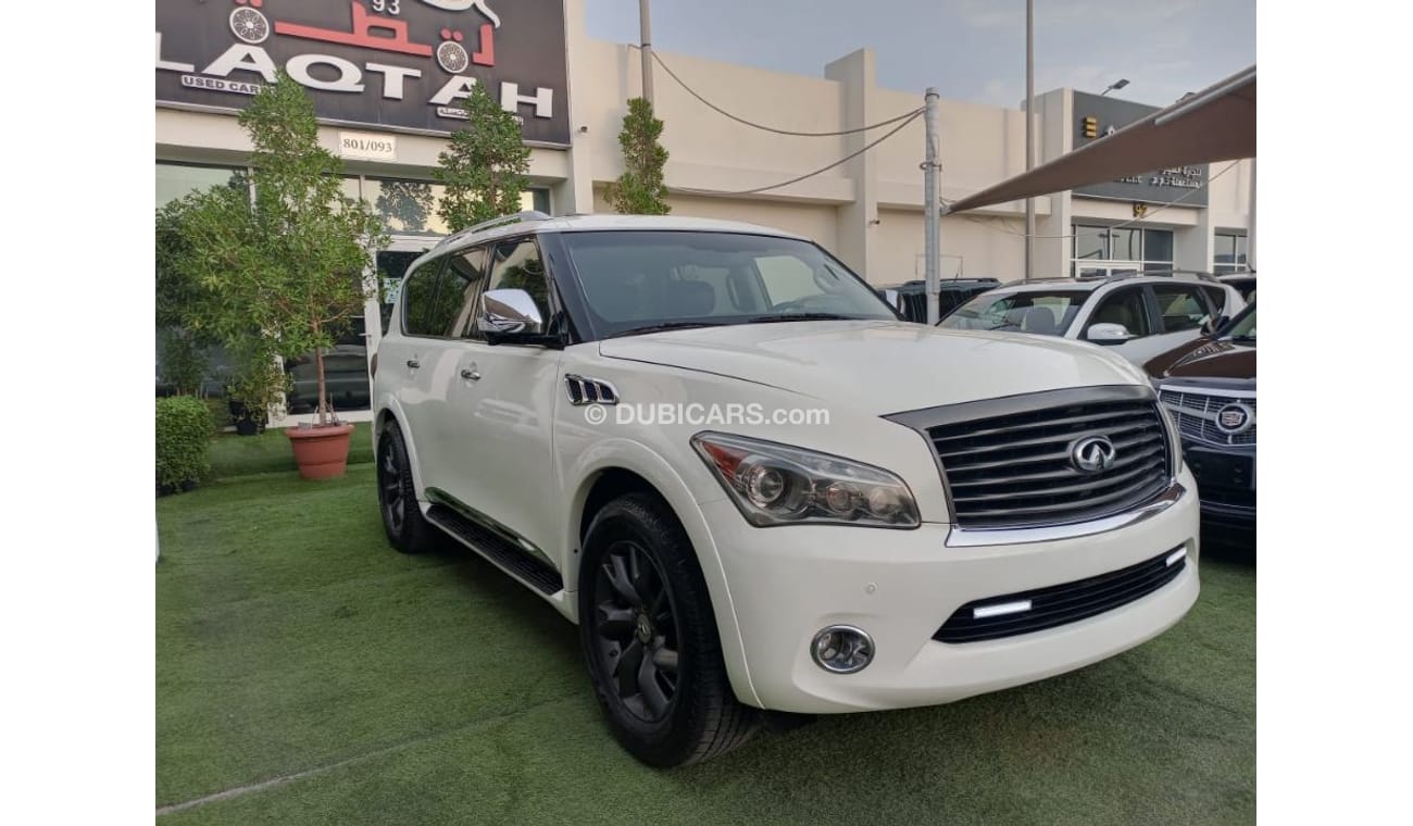 Infiniti QX56 Model 2011 imported, white color, leather opening, alloy wheels, sensors, speed stabilizer, in excel