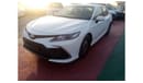 Toyota Camry LE 2022  White inside beige 2.5L petrol 4 Cylinder