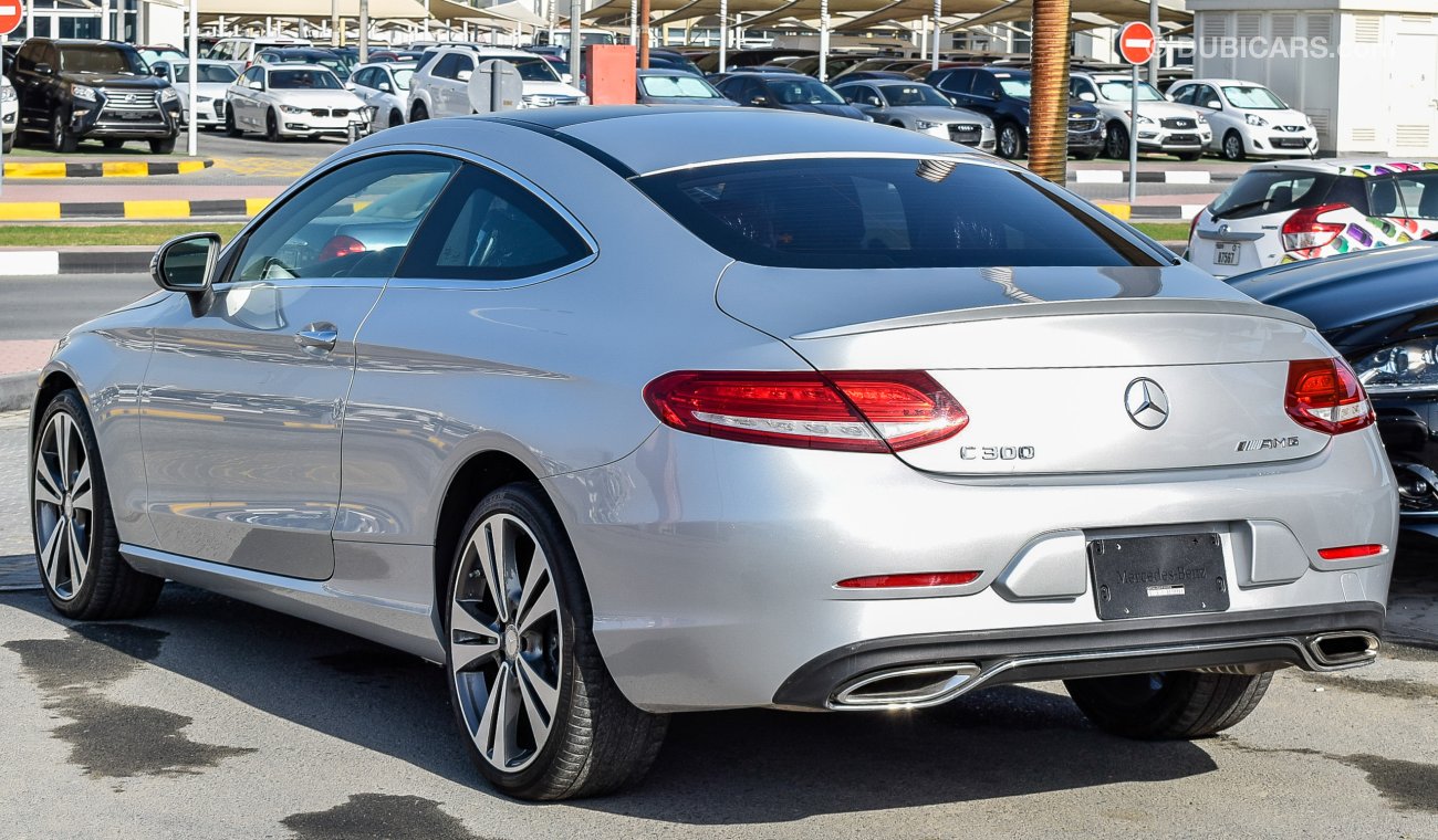 Mercedes-Benz C 300 Coupe AMG Kit، One year free comprehensive warranty in all brands.