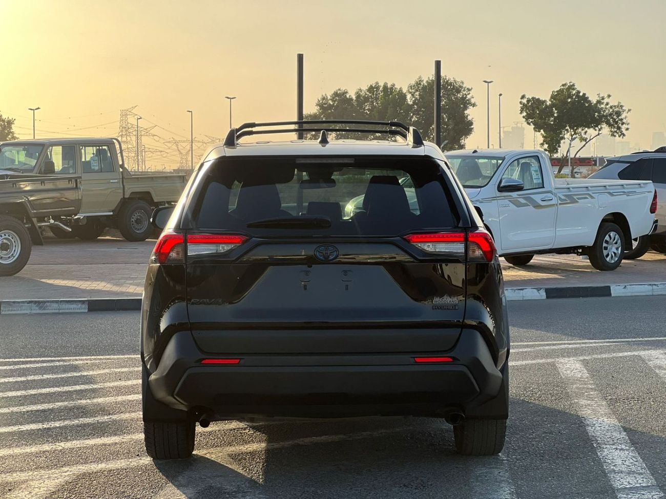 تويوتا راف ٤ 2023 Toyota RAV4 Hybrid Wood Land Edition 2.5L V4 - AWD 4x4 - Rear Camera - Leather Seats