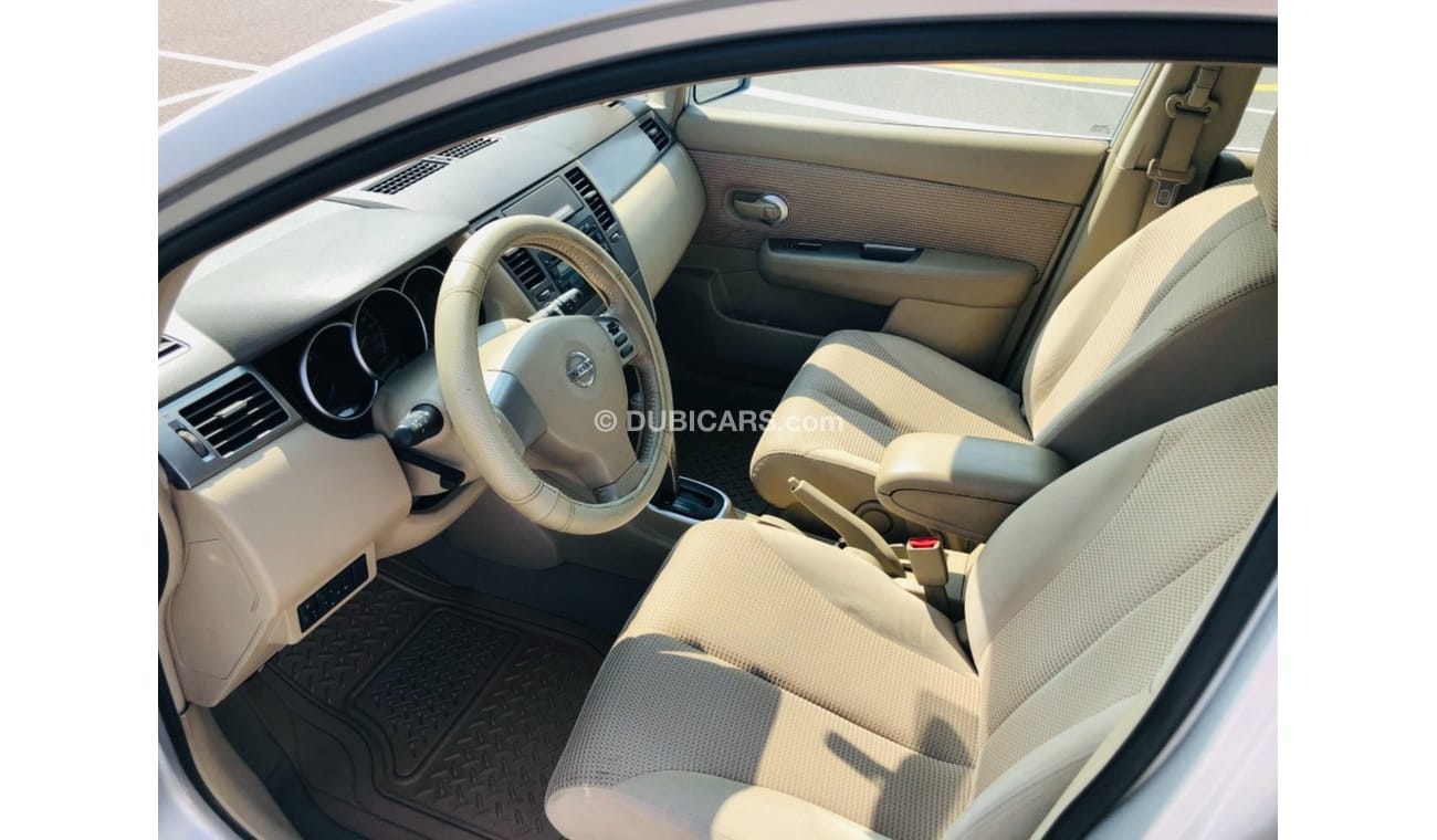 نيسان تيدا موديل 2012 خليجي فل مواصفات فتحه سقف مالك واحد من الوكاله مفتاحين فل مواصفات فتحه سقف