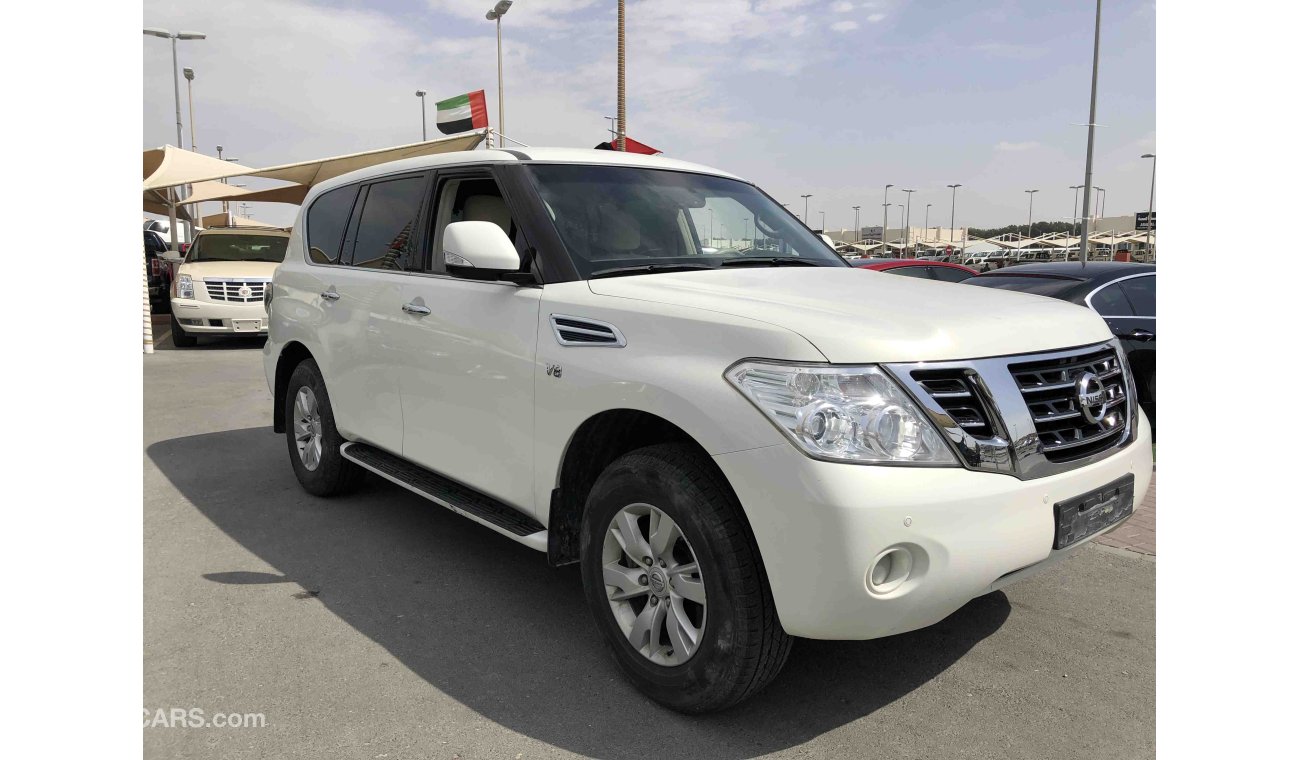 Nissan Patrol خليجي فتحة ابيض داخل بيج مالك واحد