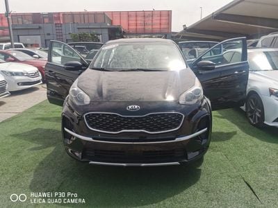 Kia Sportage 2.4L engine, family-owned.