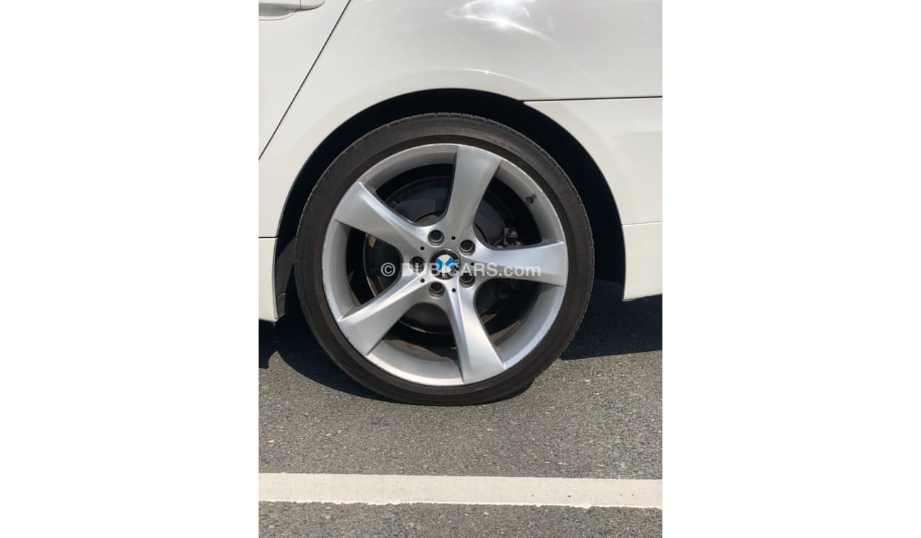 BMW 523i Model 2010 GCC car perfect condition inside and outside full option sun roof leather seats back came