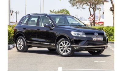 Volkswagen Touareg V6 - GCC - 2015 - ASSIST AND FACILITY IN DOWN PAYMENT - 1 YEAR WARRANTY COVERS MOST CRITICAL