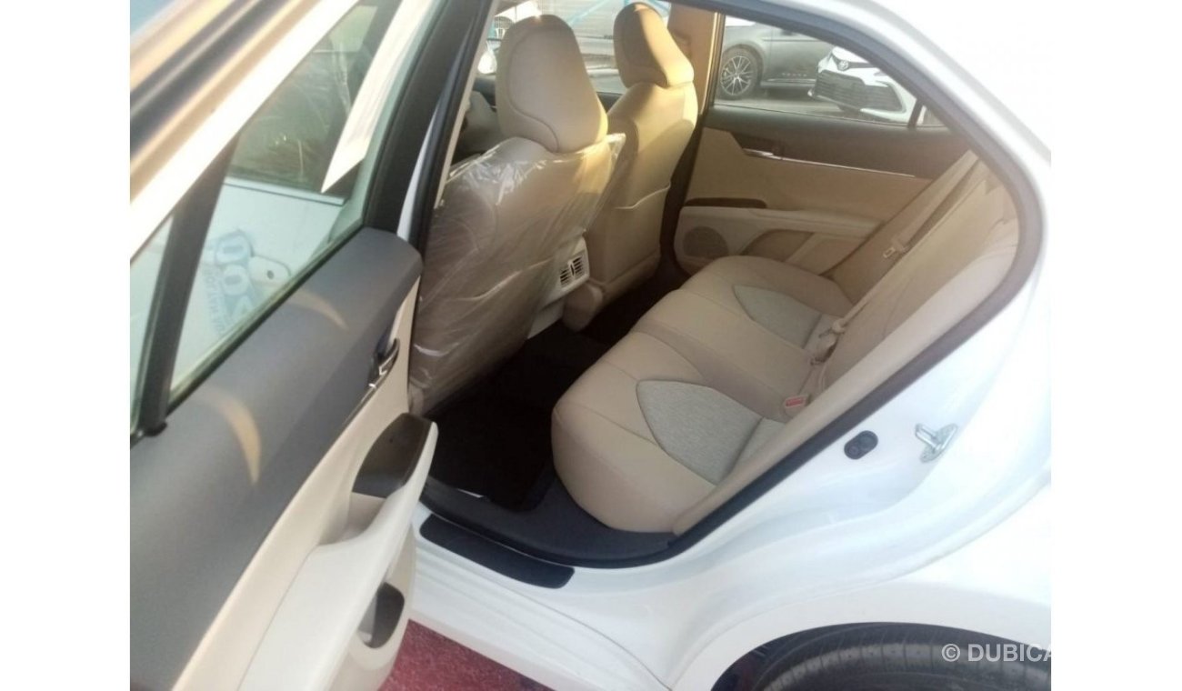 Toyota Camry LE 2022  White inside beige 2.5L petrol 4 Cylinder