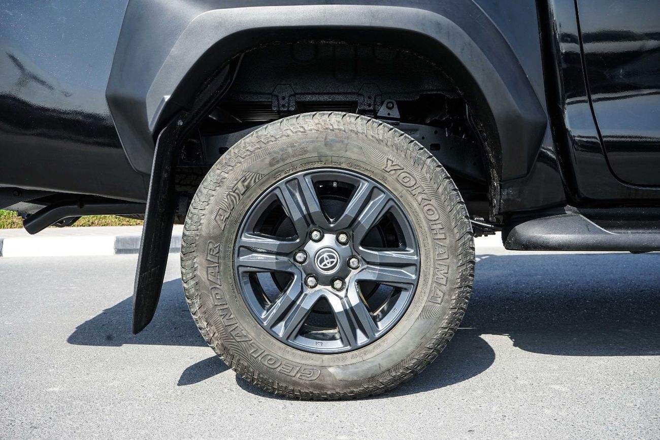 تويوتا هيلوكس The Toyota Hilux is a famously tough and versatile pickup truck, known for its rugged reliability an