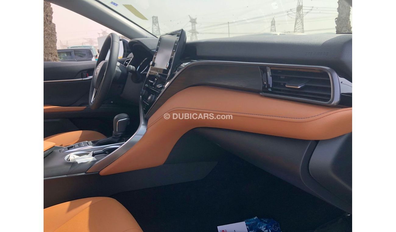 Toyota Camry TOYOTA_CAMERY_GRANDE_2023_3.5L_avaialable_white_black_hybrid