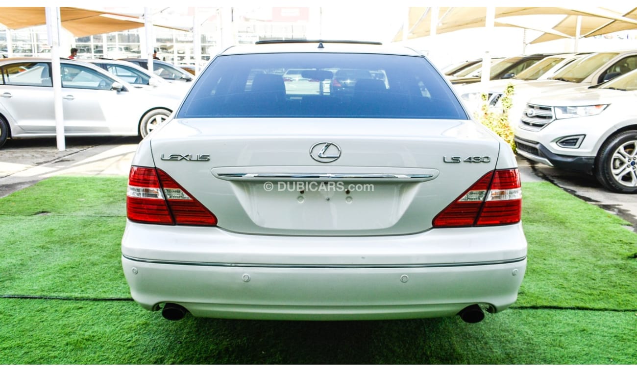 لكزس LS 430 وارد 1/2 الترا موديل 2006 لون أبيض فتحة جلد رنجات خشب مرايا كهرباء كرسي كهرباء بحالة ممتازة