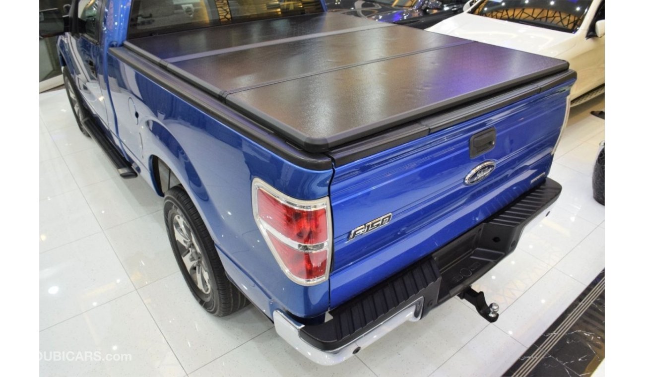Ford F-150 XLT EXCELLENT DEAL for our Ford F-150 XLT 4x4 ( 2012 Model ) in Blue Color! GCC Specs