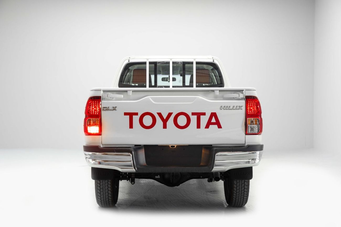 Toyota Hilux DLX 2.4L - Super White Inside Maroon | Export Only