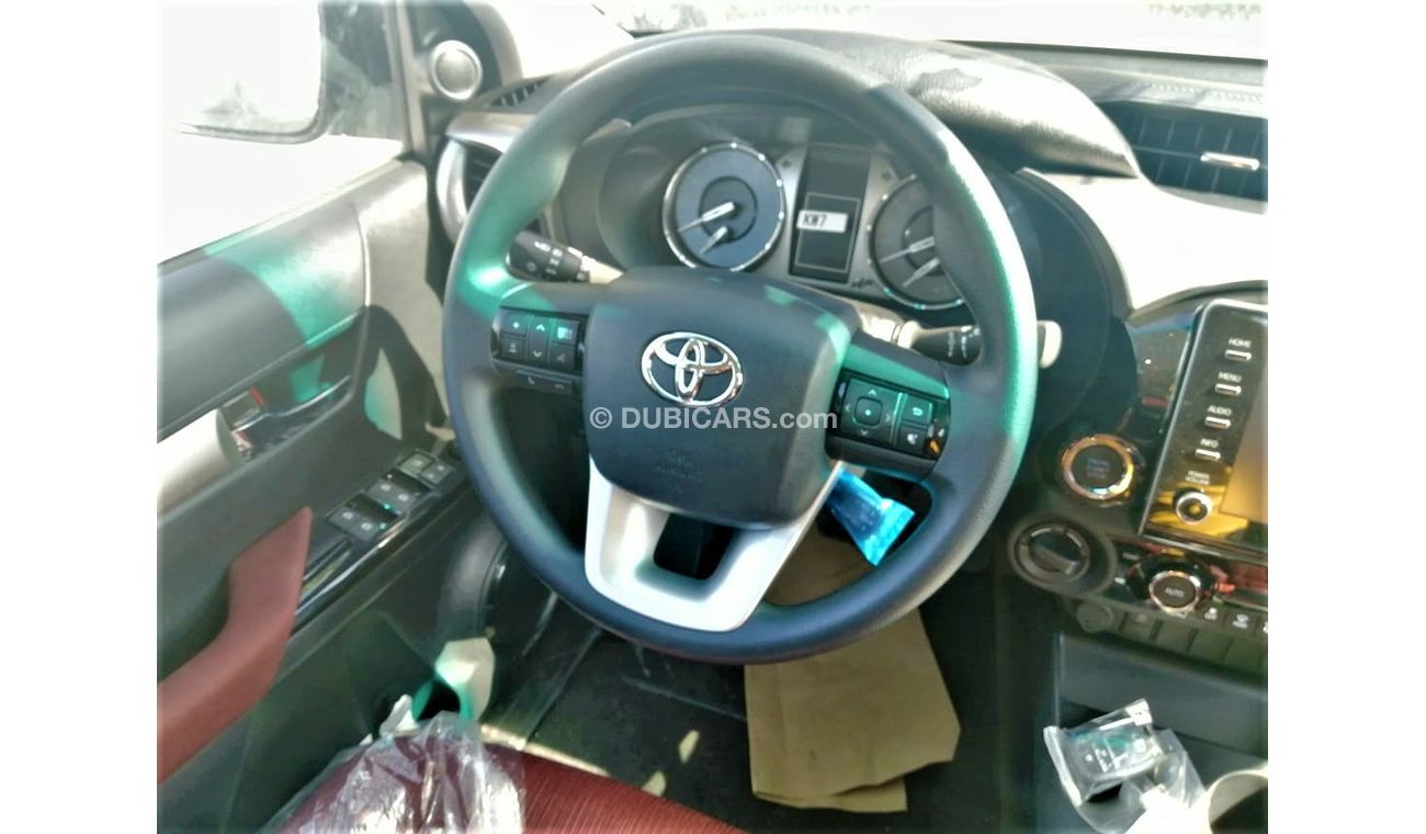 Toyota Hilux 2.7 full option with push start fridge and compr
