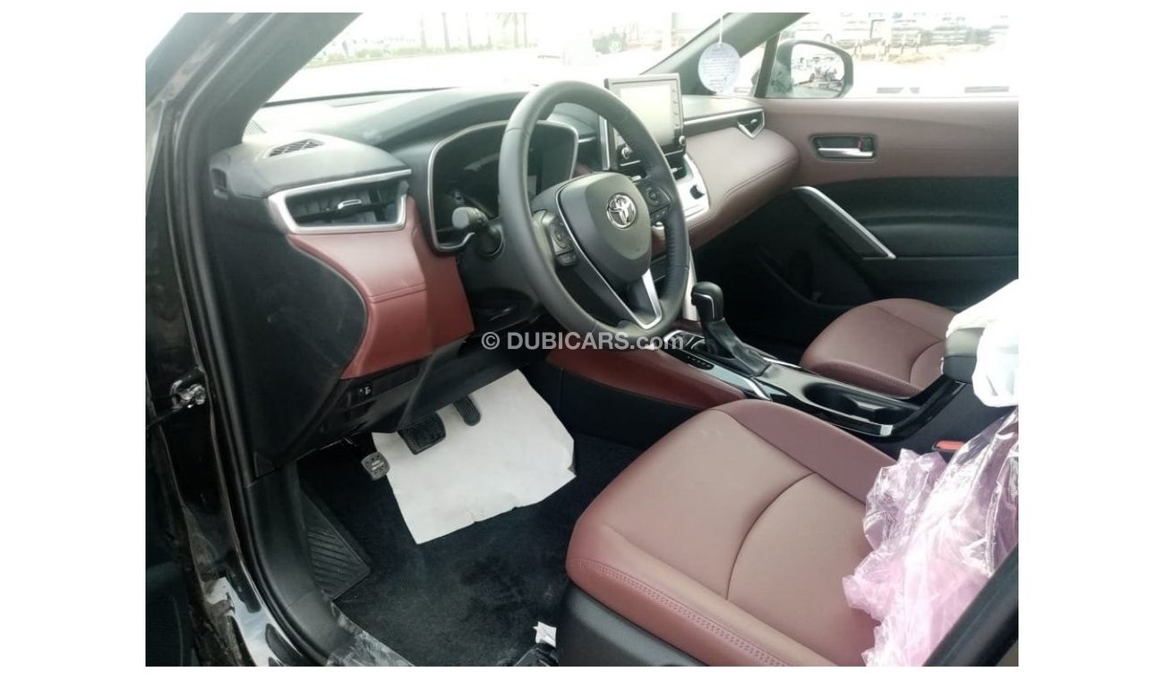 Toyota Corolla Cross Limited 1.8 petrol Hybrid  2023  Black color 4X2  FWD