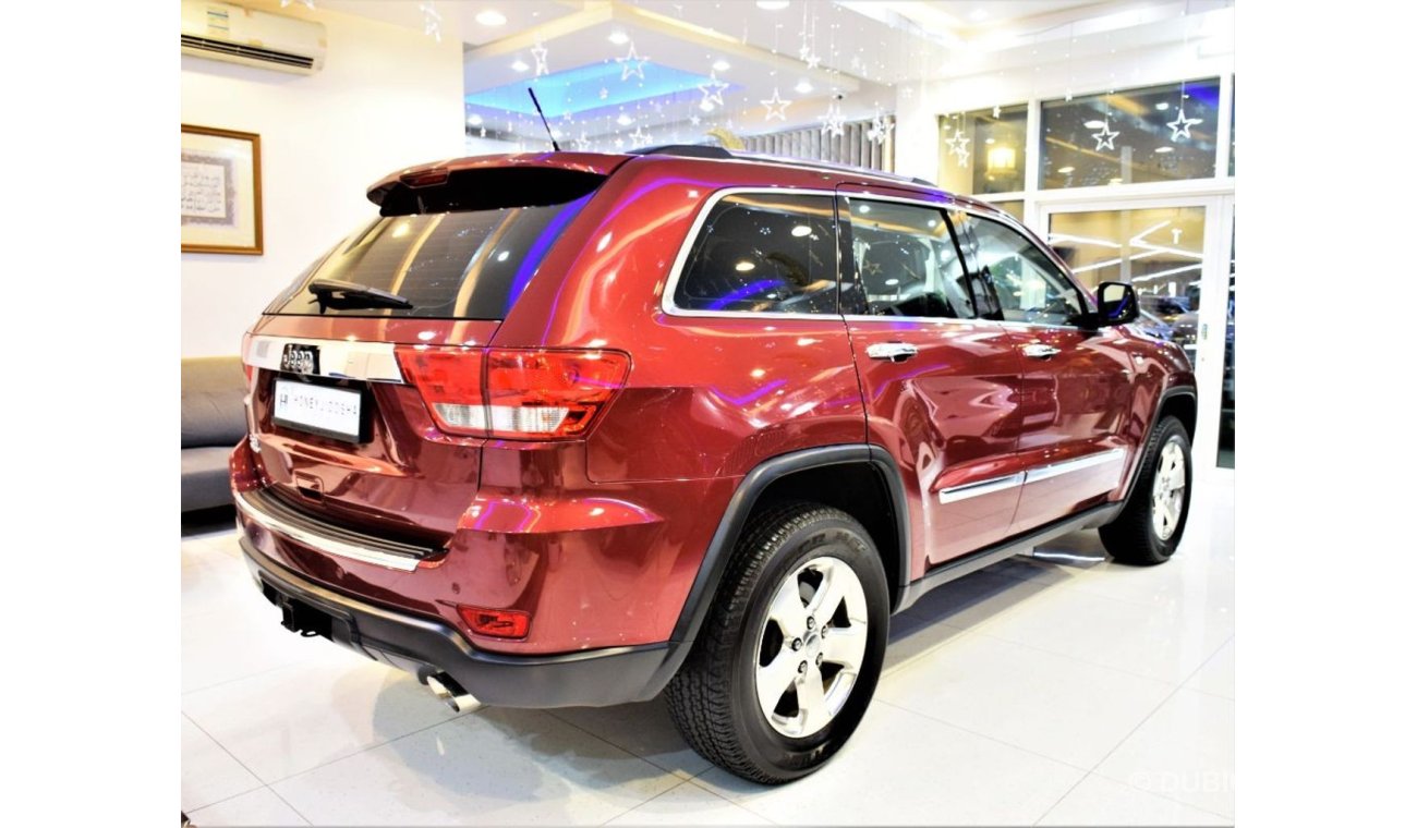 Jeep Grand Cherokee ONLY 66000 KM! Jeep Grand Cherokee 2013 Model! In Red Color! Gcc Specs