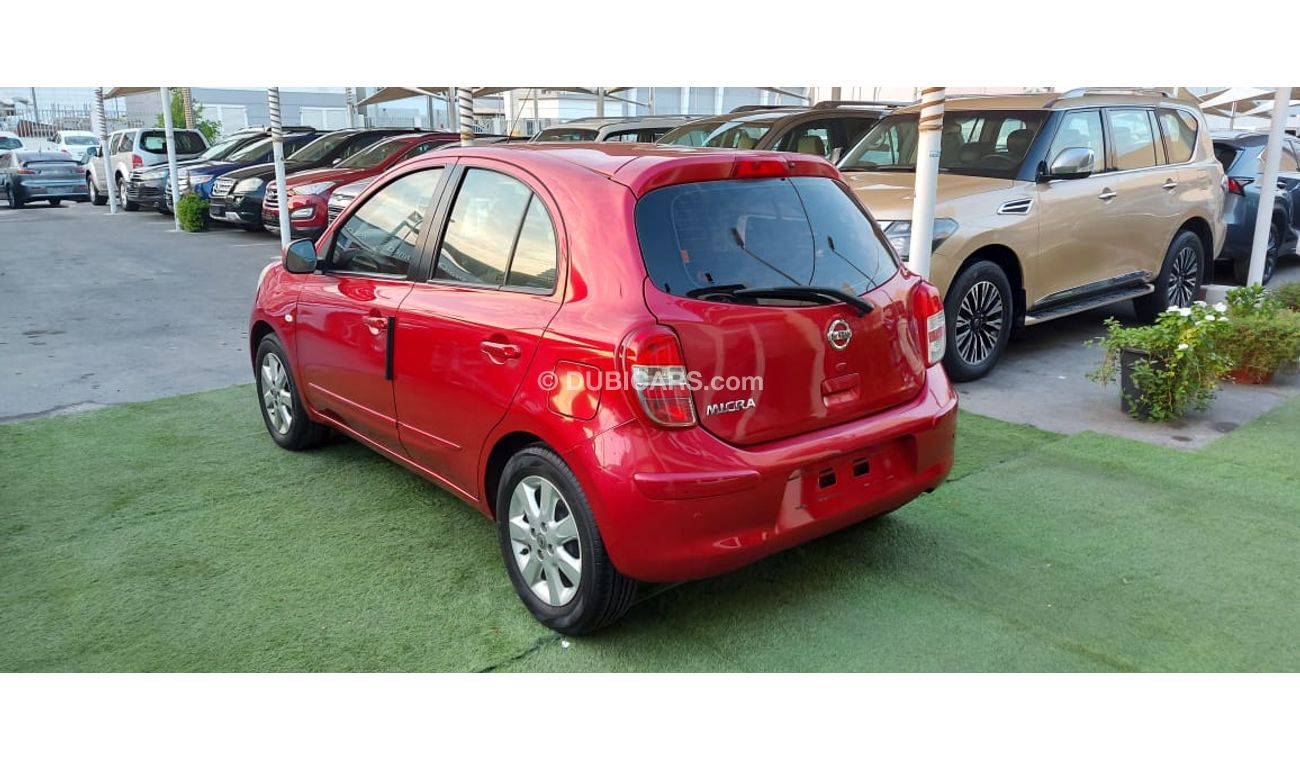 Nissan Micra Gulf number one, without accidents, fingerprint rings, sensors, back wing, electric glass, control m