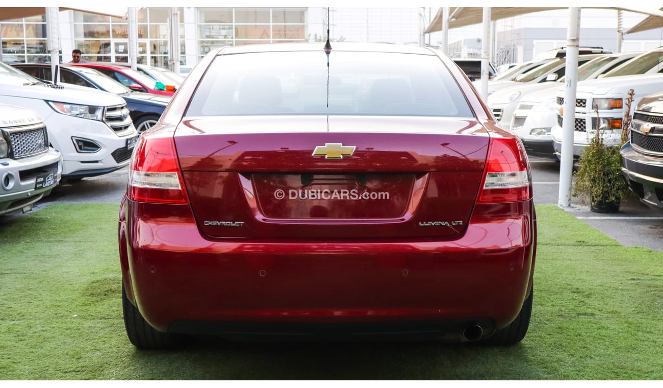 Chevrolet Lumina Gulf model 2009, red color, inside beige