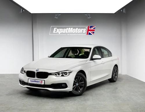 BMW 318i STANDARD 0% Down Payment Available • Full Service History • GCC