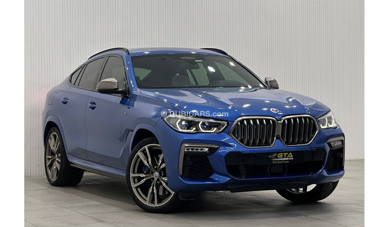 بي أم دبليو X6 2020 BMW X6 M50i, Jan 2025 BMW Warranty + Service Contract, Full Options, GCC